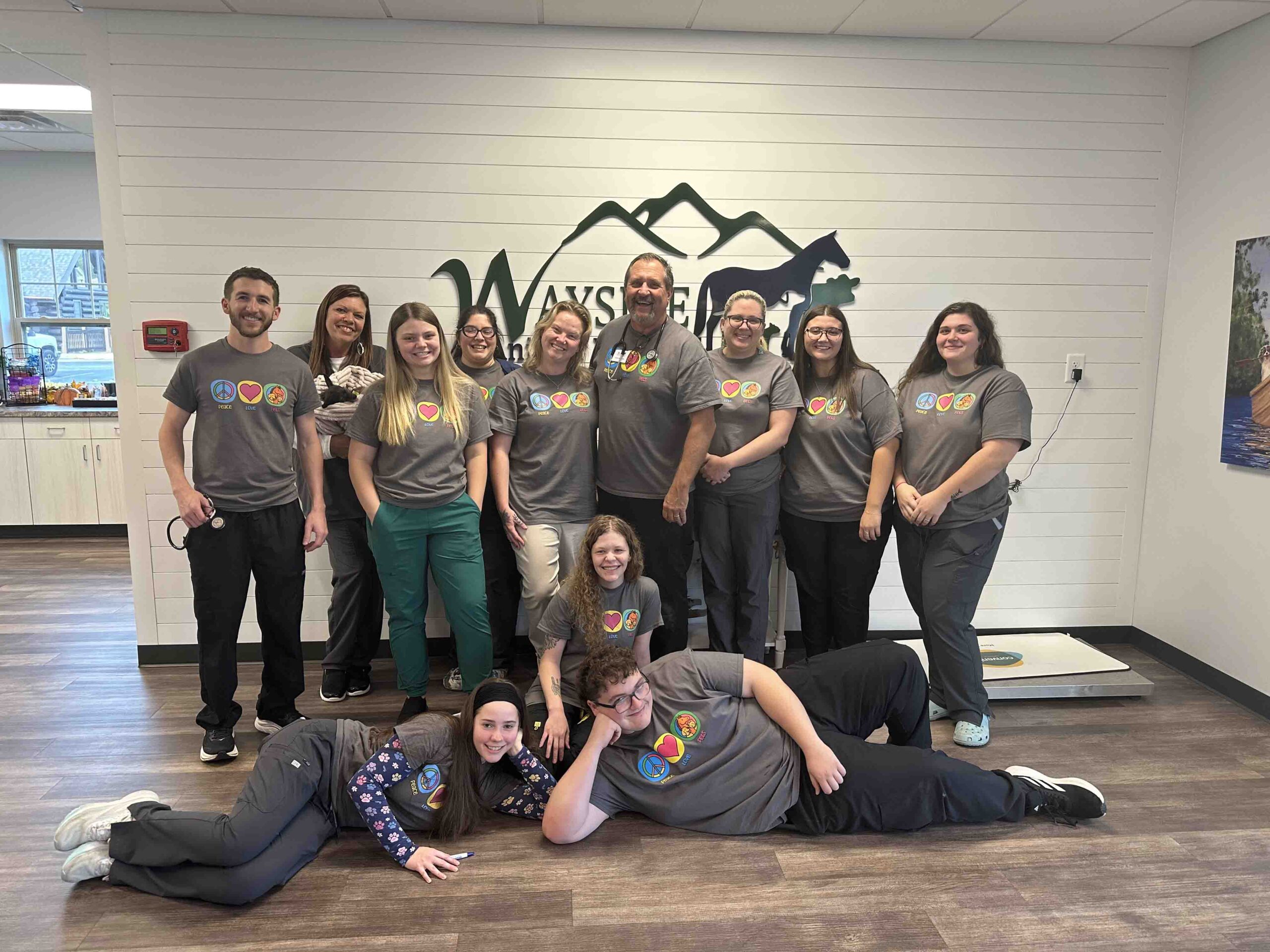 Group of smiling clinic staff
